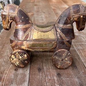 Vintage Indian wood carved two headed horse on wheels.